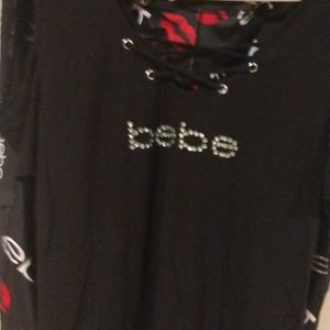 Bebe black rhinestone cut out shoulders top